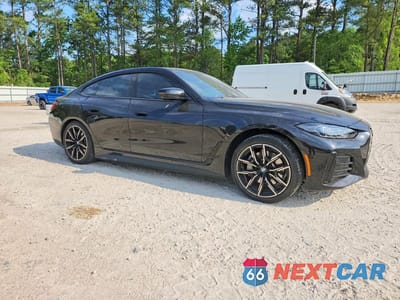Czwarte zdjęcie samochodu z boku: 2022 BMW I4 EDRIVE 40 VIN:WBY73AW01NFN10167 - miniatura