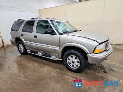 Czwarte zdjęcie samochodu z boku: 2000 GMC JIMMY / ENVOY VIN:1GKDT13W6Y2263581 - miniatura