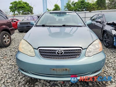 Piąte zdjęcie samochodu w środku: 2005 TOYOTA COROLLA LE VIN:2T1BR30E35C396062 - miniatura