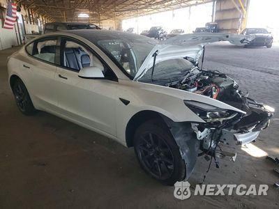 Czwarte zdjęcie samochodu z boku: 2023 TESLA MODEL 3 VIN:5YJ3E1EA2PF490992 - miniatura