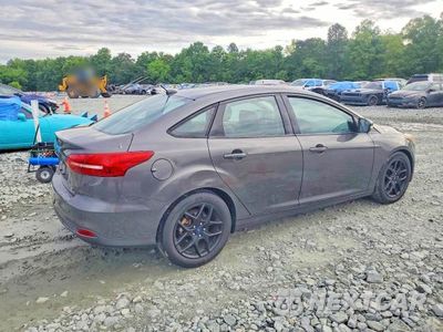 Trzecie zdjęcie samochodu z tyłu: 2016 FORD FOCUS SE VIN:1FADP3F29GL249452 - miniatura