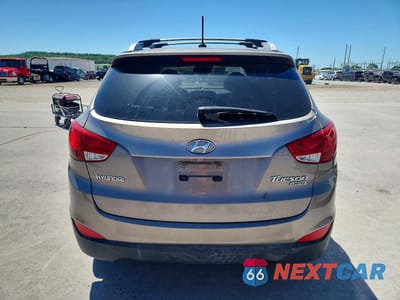 Zdjęcie 6 z 12 samochodu: 2013 HYUNDAI TUCSON LIMITED VIN:KM8JU3AC4DU579961 - miniatura