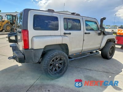 Trzecie zdjęcie samochodu z tyłu: 2009 HUMMER H3 VIN:5GTEN13E598118296 - miniatura
