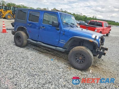Czwarte zdjęcie samochodu z boku: 2010 JEEP WRANGLER UNLIMITED SPORT VIN:1J4BA3H15AL143010 - miniatura