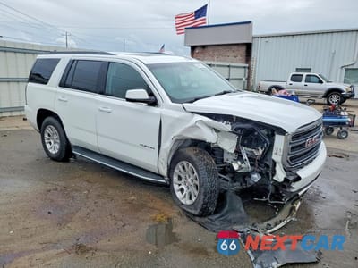 Czwarte zdjęcie samochodu z boku: 2019 GMC YUKON SLT VIN:1GKS2BKC0KR180220 - miniatura