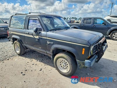 Czwarte zdjęcie samochodu z boku: 1988 FORD BRONCO II VIN:1FMCU14T1JUB89081 - miniatura