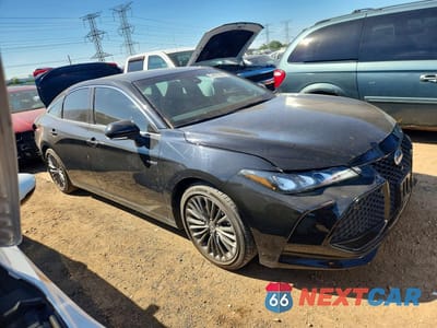 Czwarte zdjęcie samochodu z boku: 2021 TOYOTA AVALON XSE VIN:4T1EA1AB1MU005811 - miniatura