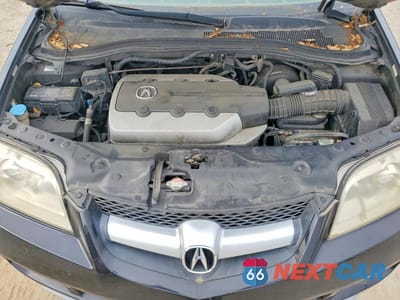 Zdjęcie 12 z 13 samochodu: 2004 ACURA MDX VIN:2HNYD18224H559595 - miniatura