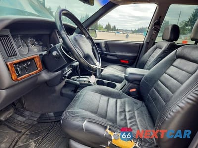 Zdjęcie 7 z 13 samochodu: 1998 JEEP GRAND CHEROKEE LAREDO VIN:1J4GZ48S3WC235284 - miniatura