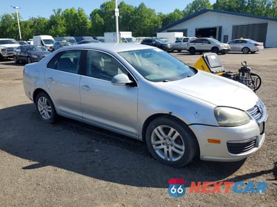 Czwarte zdjęcie samochodu z boku: 2009 VOLKSWAGEN JETTA TDI VIN:3VWAL71K29M125013 - miniatura