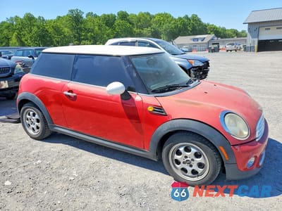 Czwarte zdjęcie samochodu z boku: 2012 MINI COOPER VIN:WMWSU3C50CT260890 - miniatura