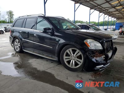 Czwarte zdjęcie samochodu z boku: 2012 MERCEDES-BENZ GL 350 BLUETEC VIN:4JGBF2FE8CA799431 - miniatura