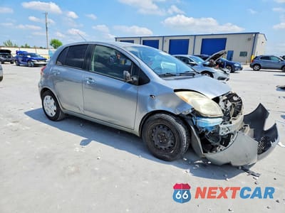 Czwarte zdjęcie samochodu z boku: 2009 TOYOTA YARIS BASE VIN:JTDKT903195259465 - miniatura