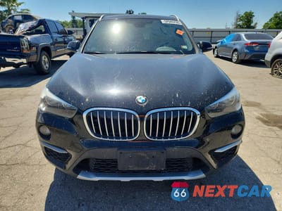 Piąte zdjęcie samochodu w środku: 2018 BMW X1 XDRIVE28I VIN:WBXHT3C38J5K28093 - miniatura