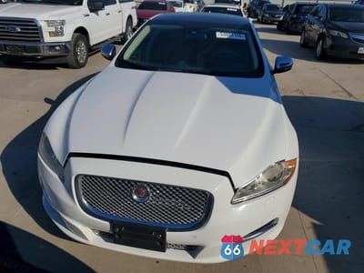 Piąte zdjęcie samochodu w środku: 2015 JAGUAR XJL PORTFOLIO VIN:SAJWJ2GD3F8V84238 - miniatura