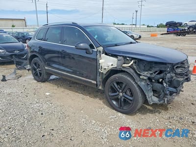 Czwarte zdjęcie samochodu z boku: 2017 VOLKSWAGEN TOUAREG WOLFSBURG VIN:WVGRF7BP3HD004584 - miniatura