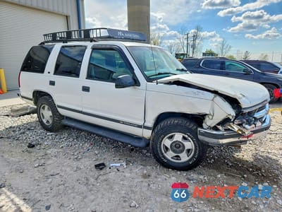 Czwarte zdjęcie samochodu z boku: 1998 CHEVROLET TAHOE K1500 VIN:1GNEK13R8WJ313548 - miniatura