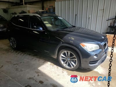 Czwarte zdjęcie samochodu z boku: 2013 BMW X1 XDRIVE35I VIN:WBAVM5C53DVV89582 - miniatura