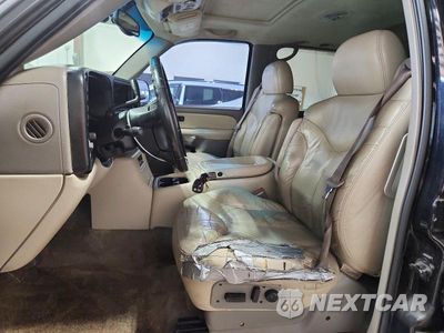 Zdjęcie 7 z 13 samochodu: 2001 GMC YUKON VIN:1GKEK13T41R134796 - miniatura