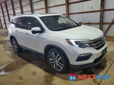 Czwarte zdjęcie samochodu z boku: 2017 HONDA PILOT TOURING VIN:5FNYF6H9XHB098345 - miniatura