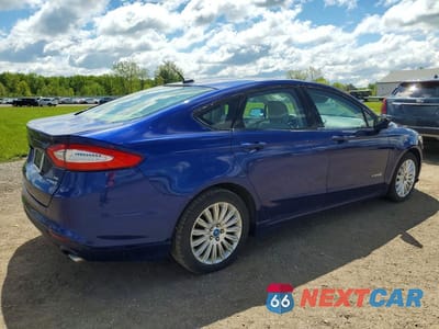 Trzecie zdjęcie samochodu z tyłu: 2013 FORD FUSION SE HYBRID VIN:3FA6P0LU7DR175670 - miniatura