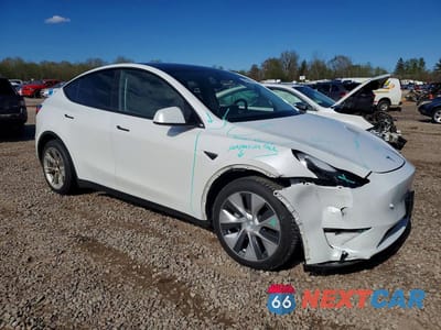 Czwarte zdjęcie samochodu z boku: 2023 TESLA MODEL Y VIN:7SAYGDEE3PF700829 - miniatura