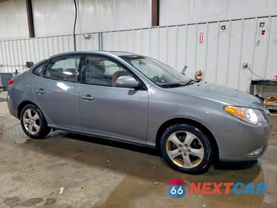 Czwarte zdjęcie samochodu z boku: 2010 HYUNDAI ELANTRA SE VIN:KMHDU4AD4AU981910 - miniatura