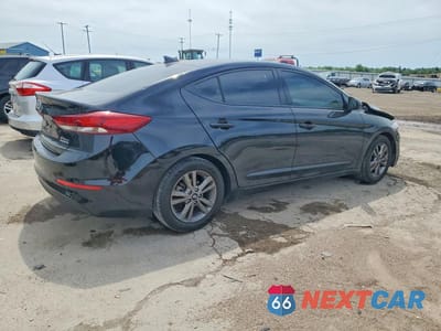 Trzecie zdjęcie samochodu z tyłu: 2018 HYUNDAI ELANTRA VALUE EDITION VIN:5NPD84LF0JH349701 - miniatura