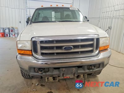 Piąte zdjęcie samochodu w środku: 1999 FORD F250 SUPER DUTY VIN:1FTNF21L2XEB16824 - miniatura