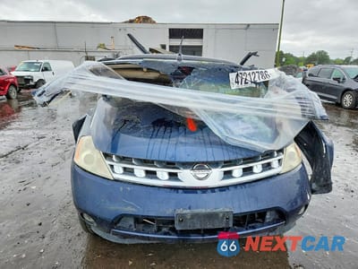 Piąte zdjęcie samochodu w środku: 2003 NISSAN MURANO SL VIN:JN8AZ08W43W237468 - miniatura