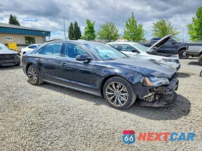 Czwarte zdjęcie samochodu z boku: 2011 AUDI A8 L QUATTRO VIN:WAURVAFDXBN015729 - miniatura