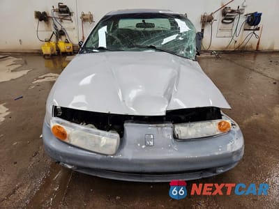 Piąte zdjęcie samochodu w środku: 2002 SATURN SL2 VIN:1G8ZK54712Z111834 - miniatura