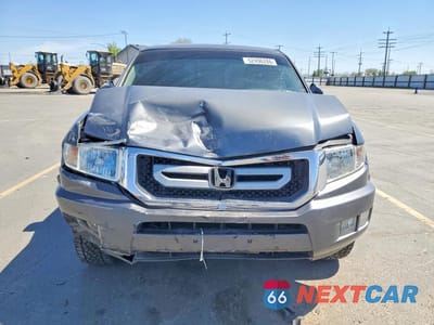 Piąte zdjęcie samochodu w środku: 2011 HONDA RIDGELINE RTL VIN:5FPYK1F58BB453705 - miniatura