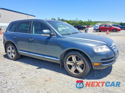 Czwarte zdjęcie samochodu z boku: 2004 VOLKSWAGEN TOUAREG TDI 5.0 VIN:WVGPZ77L64D086552 - miniatura