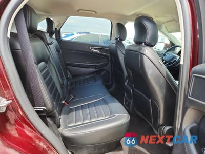 Zdjęcie 10 z 12 samochodu: 2019 FORD EDGE SEL VIN:2FMPK4J94KBB38876 - miniatura