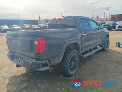 Trzecie zdjęcie samochodu z tyłu: 2024 GMC CANYON DENALI VIN:1GTP6FEK3R1228155 - miniatura