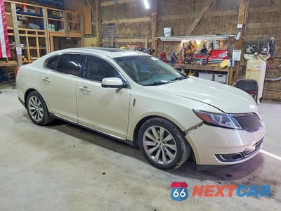 Czwarte zdjęcie samochodu z boku: 2014 LINCOLN MKS VIN:1LNHL9EK9EG607162 - miniatura