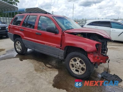 Czwarte zdjęcie samochodu z boku: 2003 JEEP GRAND CHEROKEE LAREDO VIN:1J4GX48S03C577762 - miniatura