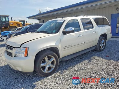2011 CHEVROLET SUBURBAN C1500 LTZ 1GNSCKE06BR357046 - główne zdjęcie licytacji z USA - miniatura