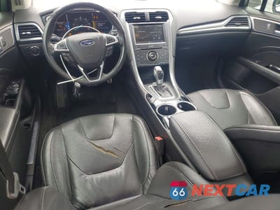 Zdjęcie 8 z 12 samochodu: 2014 FORD FUSION TITANIUM HEV VIN:3FA6P0RU9ER127502 - miniatura
