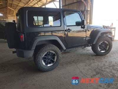 Trzecie zdjęcie samochodu z tyłu: 2015 JEEP WRANGLER SPORT VIN:1C4AJWAG7FL508490 - miniatura