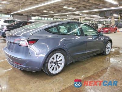 Trzecie zdjęcie samochodu z tyłu: 2022 TESLA MODEL 3 VIN:5YJ3E1EA7NF188093 - miniatura