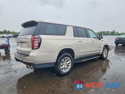 Trzecie zdjęcie samochodu z tyłu: 2021 CHEVROLET SUBURBAN K1500 PREMIER VIN:1GNSKFKD7MR162030 - miniatura