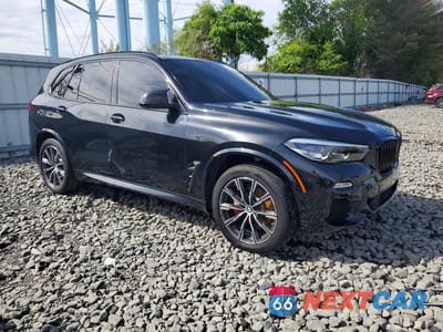Czwarte zdjęcie samochodu z boku: 2020 BMW X5 XDRIVE40I VIN:5UXCR6C02L9C91877 - miniatura