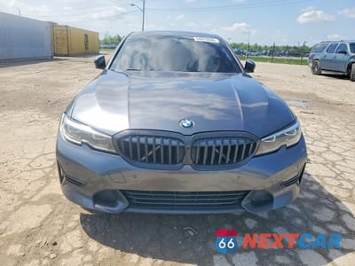 Piąte zdjęcie samochodu w środku: 2021 BMW 330XI VIN:WBA5R7C08MFK82663 - miniatura