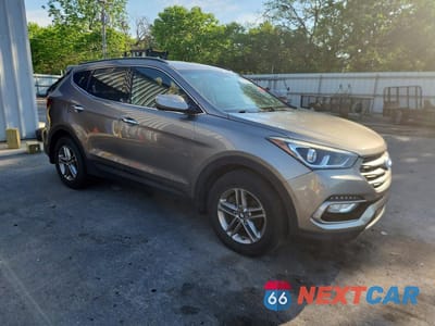 Czwarte zdjęcie samochodu z boku: 2018 HYUNDAI SANTA FE SPORT 2.4L VIN:5NMZUDLB6JH066005 - miniatura