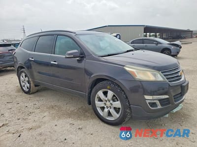 Czwarte zdjęcie samochodu z boku: 2016 CHEV TRAVERSE VIN:1GNKRGKD0GJ177408 - miniatura