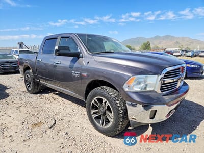 Czwarte zdjęcie samochodu z boku: 2016 RAM 1500 SLT VIN:1C6RR7LT8GS222643 - miniatura