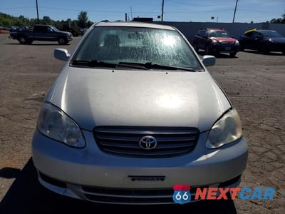 Piąte zdjęcie samochodu w środku: 2003 TOYOTA COROLLA LE VIN:2T1BR32E23C124564 - miniatura
