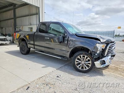 Czwarte zdjęcie samochodu z boku: 2015 FORD F150 SUPER CAB VIN:1FTEX1EP6FKD27335 - miniatura
